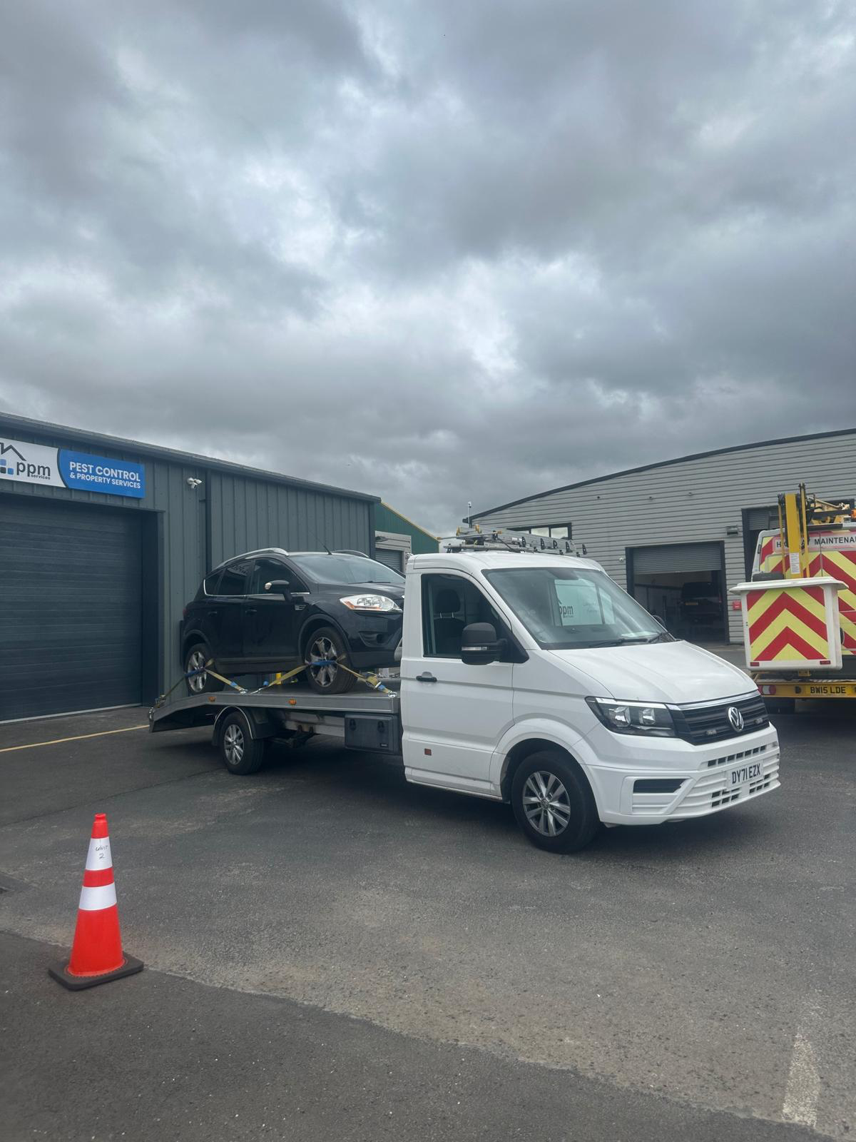 Black Ford Kuga loaded for vehicle transport by CT Recovery