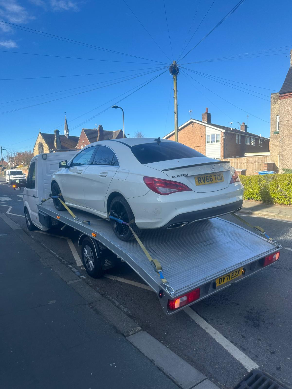 White Mercedes CLA collected on a Peterborough street for car recovery