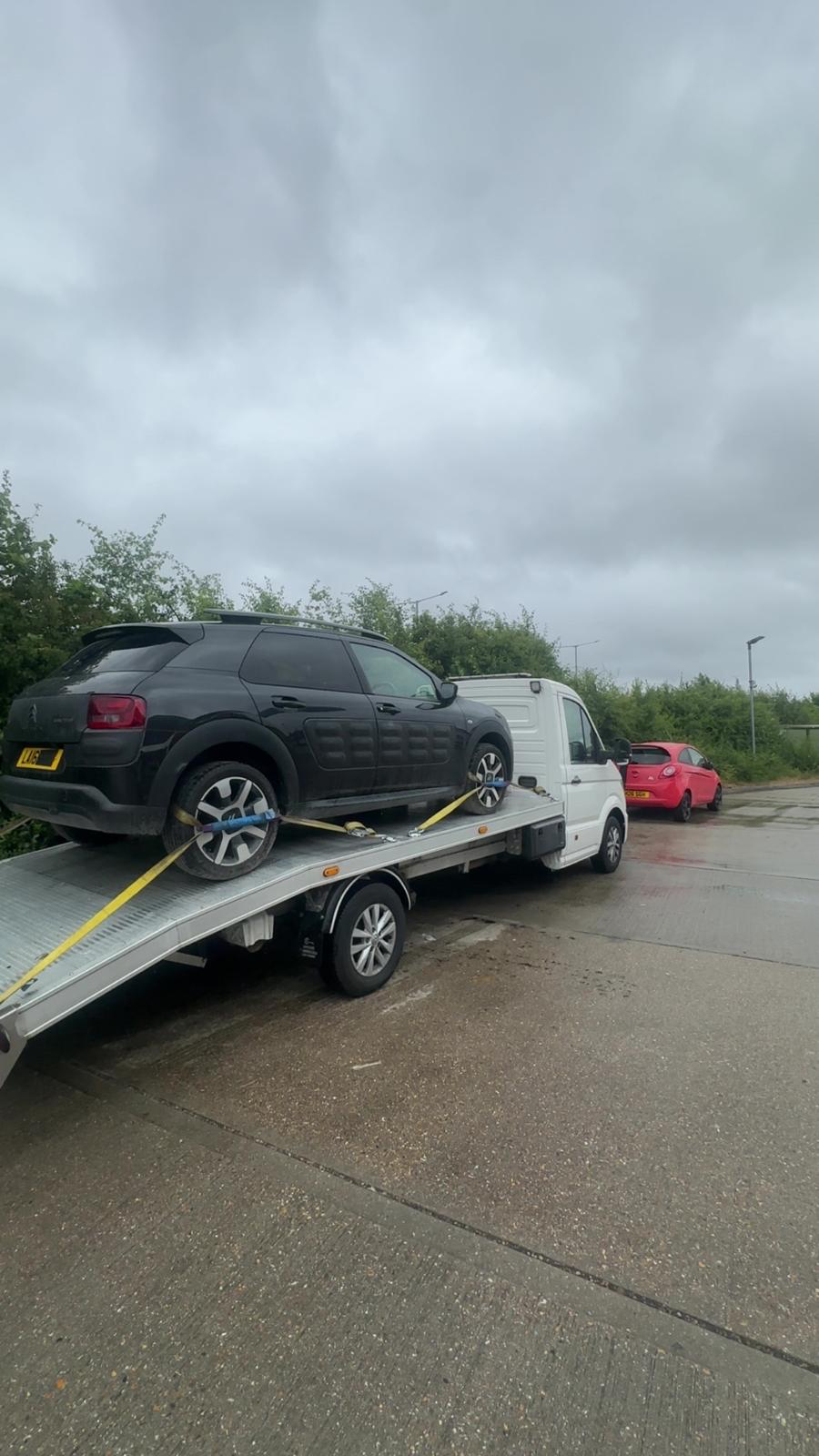 Black Citroen C4 Cactus SUV loaded for breakdown recovery